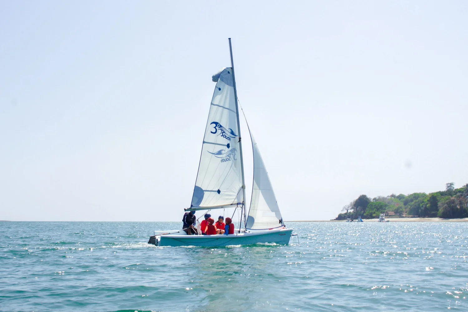 A 3 Degrees South Laser sailing dinghy off Mnarani
