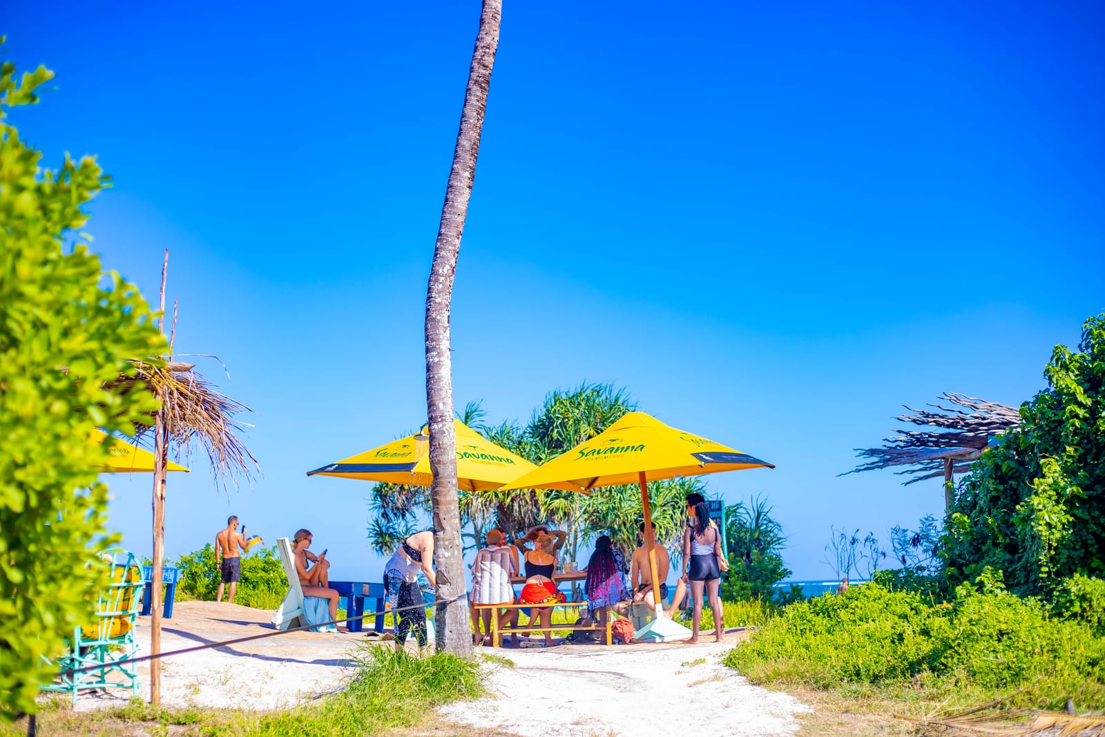 The beach lounge area under blue skies at Salty's Kitesurf Village